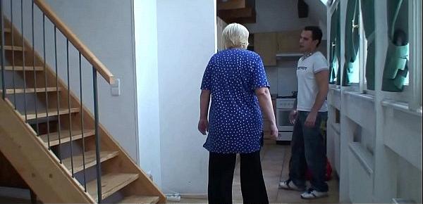  Big tits blonde granny pleases younger stranger